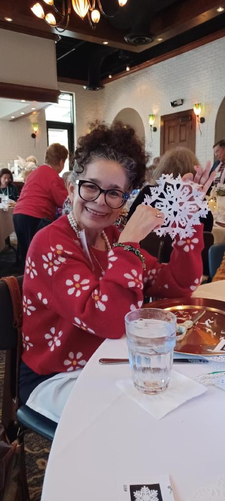 Elizabeth Ramirez proudly display her snowflake.